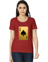 Woman wearing a red t-shirt with a gold and black playing card design on a white background
