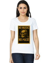Woman wearing a white t-shirt with a graphic design featuring a skull and headphones on a black background.