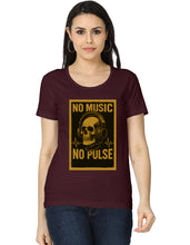 Woman wearing a maroon t-shirt with a graphic design featuring a skull and headphones, text 'NO MUSIC NO PULSE', on a white background.