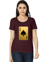 Woman wearing a maroon t-shirt with a gold and black playing card design on a white background
