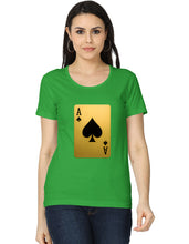 Woman wearing a green t-shirt with a gold playing card design on a white background