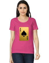 Woman wearing a pink t-shirt with a playing card design on a white background