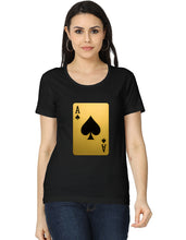 Woman wearing a black t-shirt with a gold and black playing card design on a white background