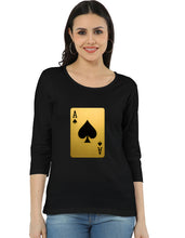 Woman wearing a black t-shirt with a gold playing card design on a white background