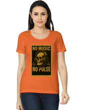 Woman wearing an orange t-shirt with a graphic design and text.
