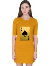Woman wearing a mustard yellow dress with a playing card design on a white background