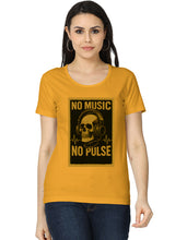 Woman wearing a mustard yellow t-shirt with a skull and headphones graphic and text 'NO MUSIC NO PULSE'.