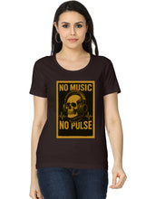 Woman wearing a black t-shirt with a yellow graphic design featuring a skull and headphones.