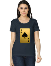 Woman wearing a black t-shirt with a gold and black playing card design on a white background