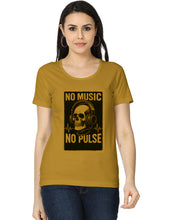 Woman wearing a mustard yellow t-shirt with a skull and headphones graphic and text 'NO MUSIC NO PULSE'.