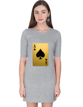 Woman wearing a gray dress with a playing card design on a white background