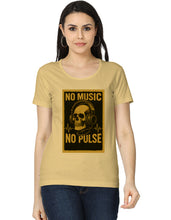 Woman wearing a beige t-shirt with a graphic design and text 'No Music, No Pulse' on a white background