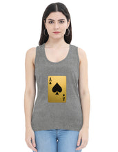 Woman wearing a gray sleeveless top with a gold and black card design on a white background