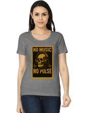 Woman wearing a gray t-shirt with a graphic design featuring a skull and headphones on a white background.
