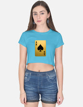 Woman wearing a blue t-shirt with a yellow playing card design on a white background