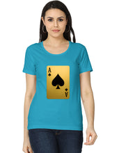 Woman wearing a blue t-shirt with a gold playing card design on a white background