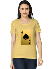 Woman wearing a yellow t-shirt with a playing card design on a white background