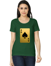 Woman wearing a green t-shirt with a gold and black playing card design on a white background