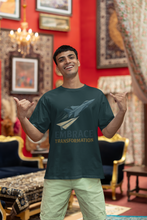Man wearing a t-shirt with 'Embrace Transformation' in an ornate room.