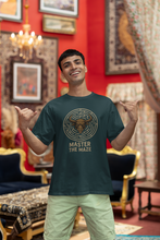 Man wearing a t-shirt with 'Master the Maze' design in an ornate room.