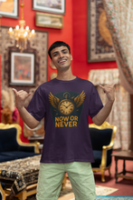 Man wearing a t-shirt with 'Now or Never' design in a decorated room.