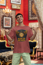 Man wearing a t-shirt with a clock design and text in a decorated room.