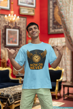 Man wearing a blue t-shirt with a graphic design and text, standing in an ornate room.
