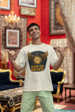 Man wearing a t-shirt with 'Now or Never' design in a decorated room.