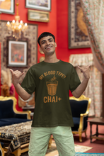 Person wearing a green t-shirt with a humorous design on a white background