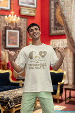 Man wearing a t-shirt with a graphic and text in a decorated room.