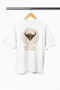 White t-shirt with a bull graphic and 'Master the Maze' text on a hanger against a white background