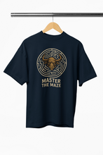 Black t-shirt with bull head maze design and 'Master the Maze' text on a hanger.