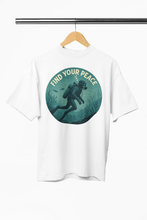 White t-shirt with 'Find Your Peace' graphic on a hanger
