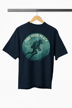 Black t-shirt with 'Find Your Peace' graphic on a hanger against a white background