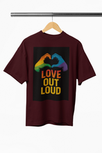 Maroon t-shirt with rainbow hands and 'Love Out Loud' text on a hanger against a white background