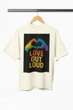 White t-shirt with 'Love Out Loud' graphic on a hanger against a white background