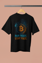 Black t-shirt with Bitcoin symbol and text on a beige background