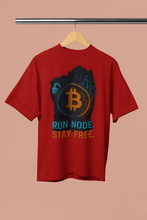 Red t-shirt with Bitcoin logo and text on a beige background
