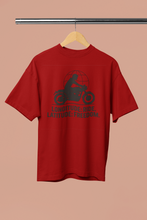 Red t-shirt with graphic design and text on a beige background