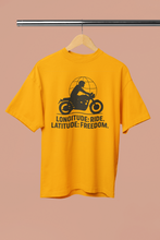 Yellow t-shirt with motorcycle graphic and text on a beige background