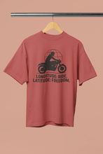 Red t-shirt with motorcycle graphic and text on a beige background