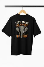 Black t-shirt with elephant graphic and text on a hanger against a white background