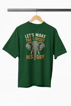 Green t-shirt with elephant graphic and text on a hanger against a white background