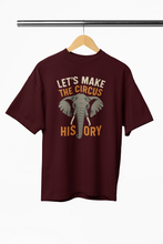 Maroon t-shirt with elephant graphic and text on a hanger against a white background