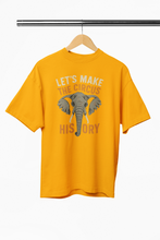 Yellow t-shirt with elephant graphic and text on a hanger against a white background