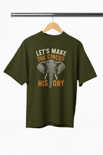Green t-shirt with elephant graphic and text on a hanger against a white background