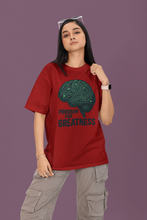 Person wearing a red t-shirt with a brain graphic and text on a purple background