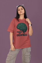 Person wearing a red t-shirt with a brain graphic and text on a purple background