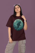 Person wearing a t-shirt with 'Find Your Peace' graphic design on a purple background
