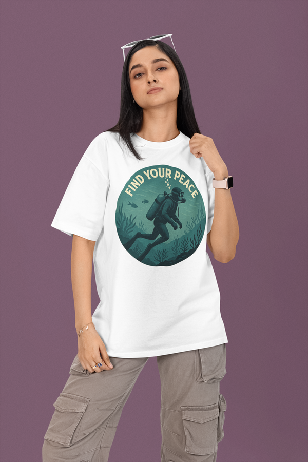 Person wearing a white t-shirt with a graphic design and text on a purple background